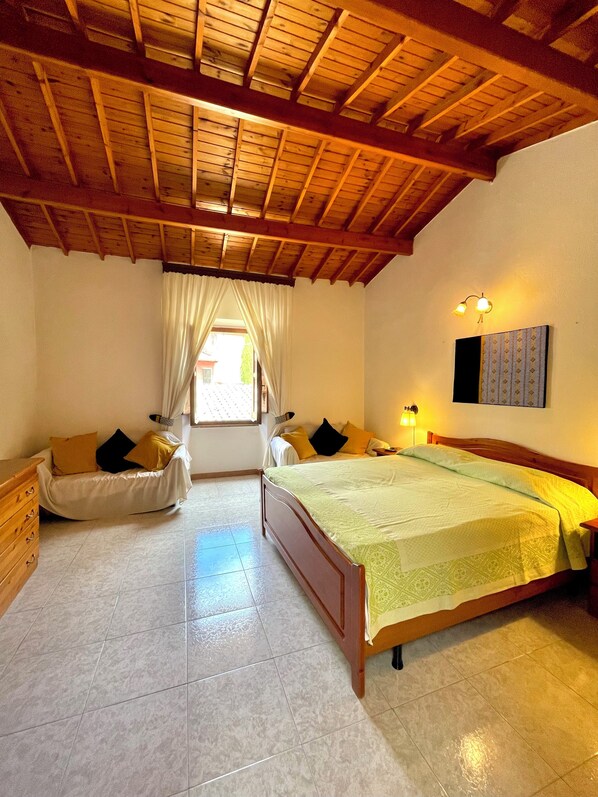 1 bedroom, desk, iron/ironing board, travel crib