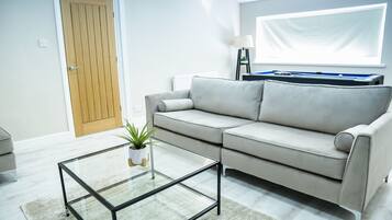 House | Living room | 30-inch TV with digital channels