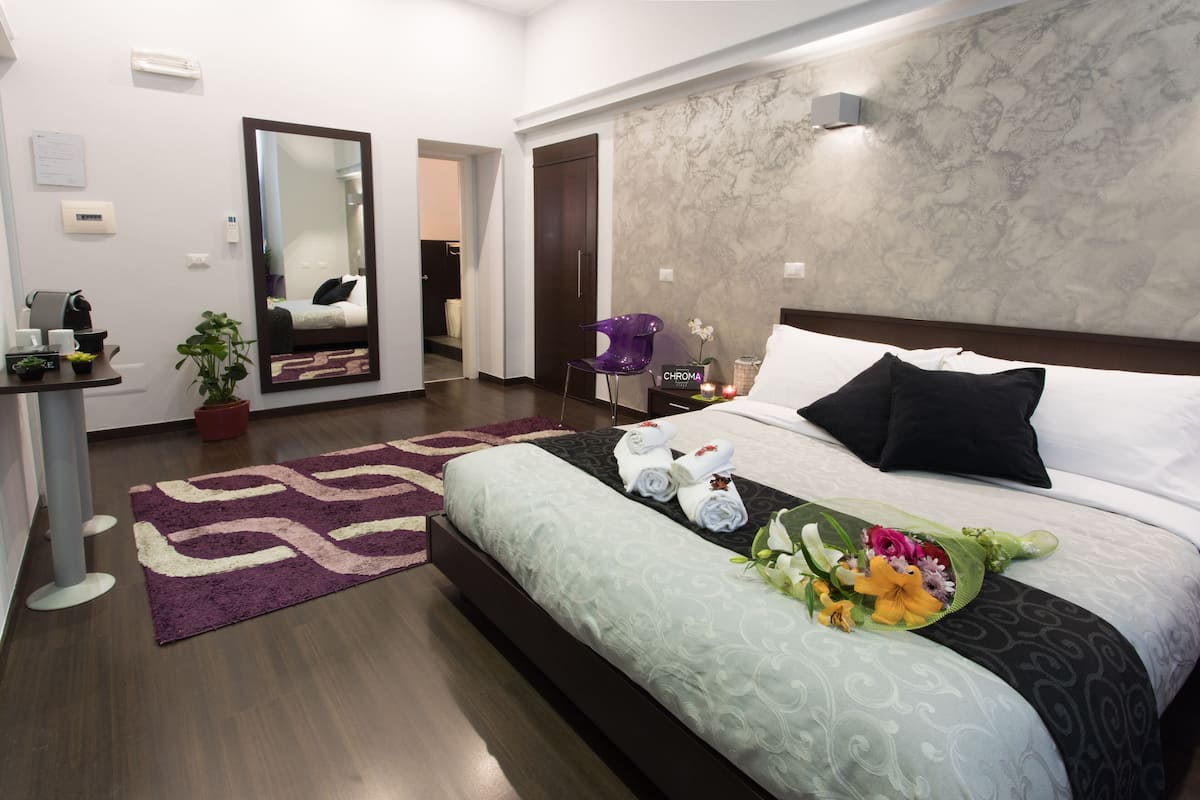 In-room safe, blackout drapes, iron/ironing board, travel crib