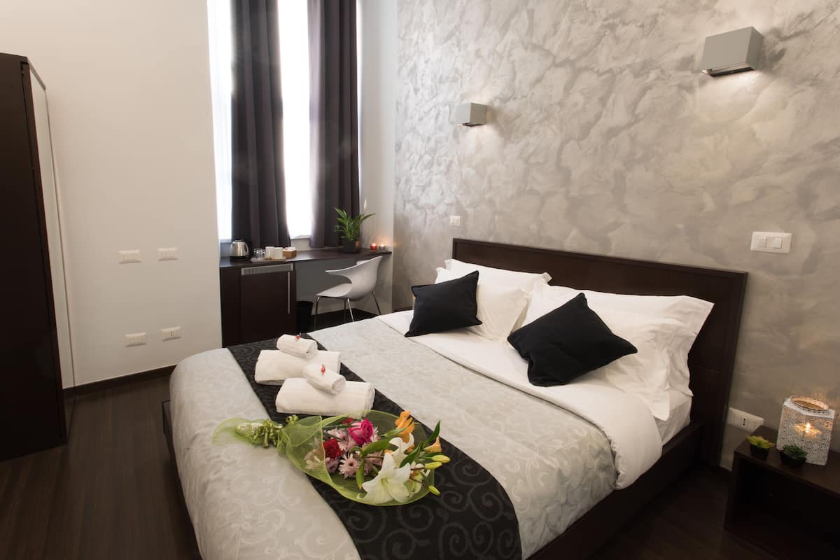 In-room safe, blackout drapes, iron/ironing board, travel crib