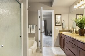 Combined shower/tub, towels, soap, toilet paper