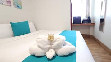 Deluxe King Room | Premium bedding, in-room safe, individually decorated