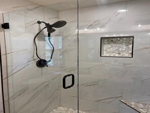 Combined shower/tub, hair dryer, towels, soap