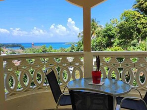Outdoor dining - Charming 2-Bedroom Retreat with AC, Sea & Mountain Views, Steps from Downtown! (Port Antonio)