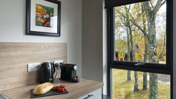 Standard-huoneisto, oma kylpyhuone (Apartment Spey) | Yksityinen keittiö | Syöttötuoli