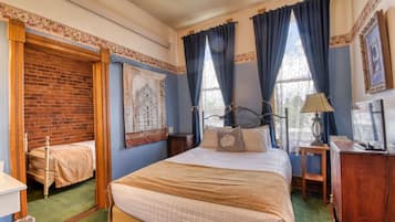 Suite junior, varias camas | 2 habitaciones, wifi gratis y ropa de cama