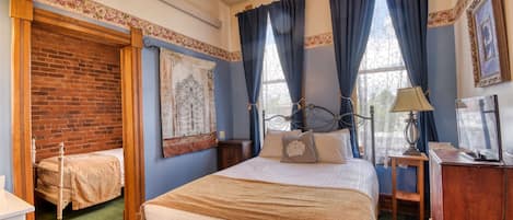 Suite junior, varias camas | 2 habitaciones, wifi gratis y ropa de cama
