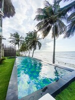 Outdoor pool, open 8:00 AM to 10:00 PM, sun loungers