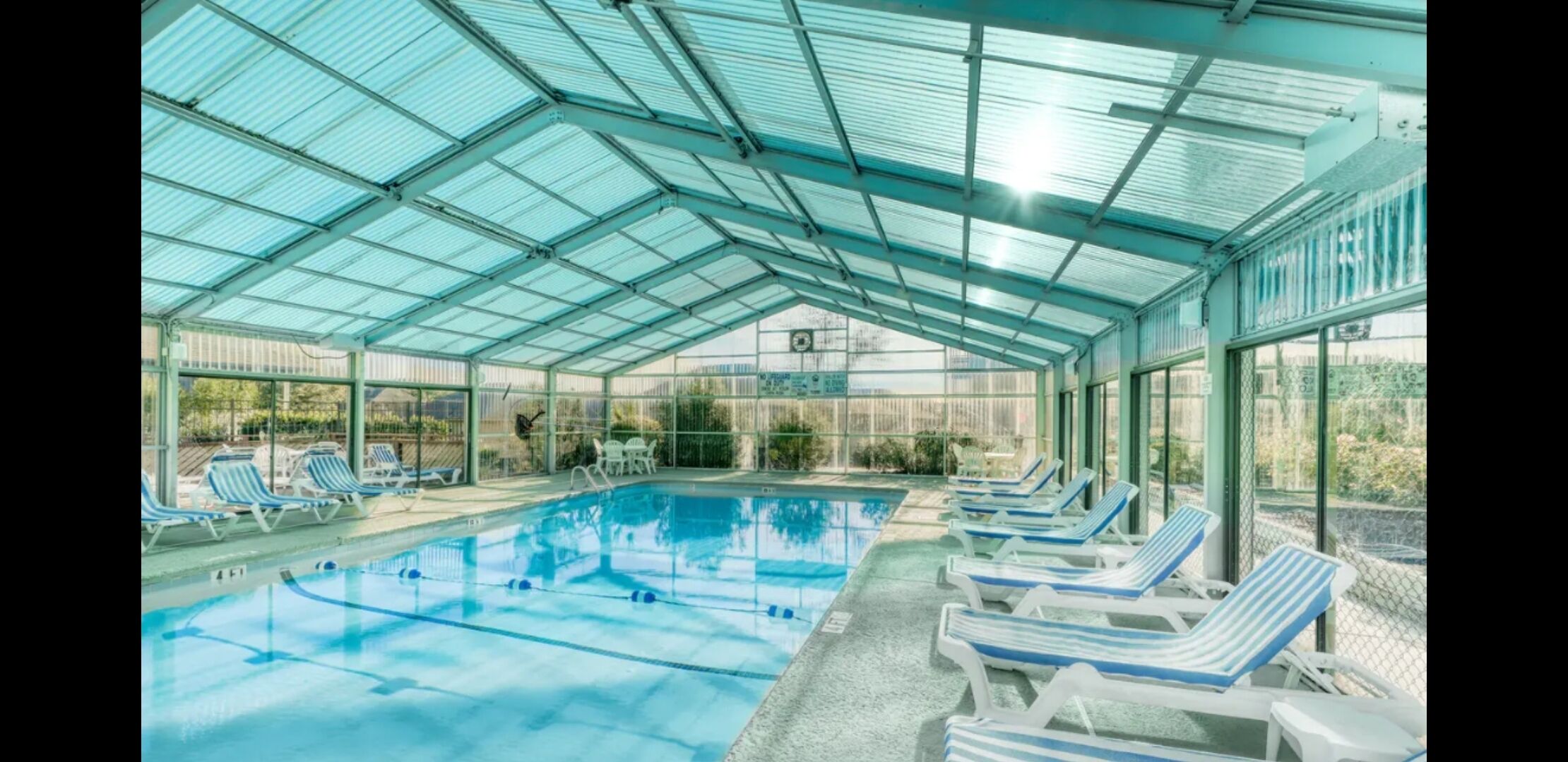 End Unit with 2 Screened  porches  Ocean View Indoor and Outdoor Pool