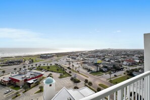 Stroll along the oceanfront road, taking in the sights of this well-planned coastal town with a mix of commercial and residential buildings.