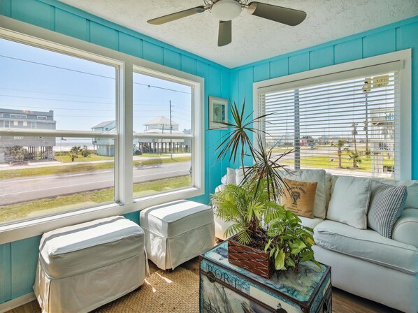 Relax in this inviting space with a large window offering views of the surrounding area.