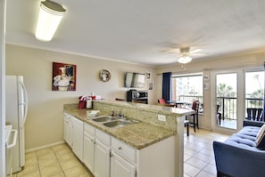 Condo, Multiple Beds, Ocean View | Private kitchen | Fridge, microwave, oven, stovetop