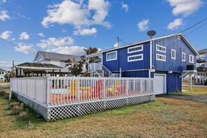 Family-friendly home with a fenced yard and play structure.