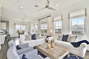 House (3 Bedrooms) | Living area | 55-inch flat-screen TV with cable channels, TV - Wine Down by Ryson Vacation Rentals (Galveston)