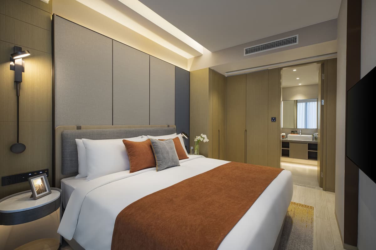 One-Bedroom Premier | Premium bedding, minibar, in-room safe, desk