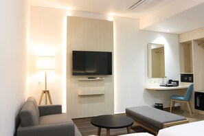 32-inch LED TV with cable channels, TV - Cordia Hotel Banjarmasin - Hotel Dalam Bandara (Banjarbaru)