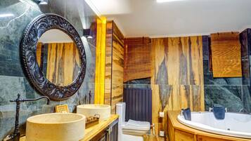 Family Room, 2 Bedrooms | Bathroom | Shower, hydromassage showerhead, hair dryer, slippers