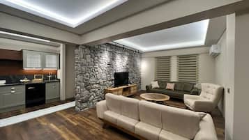 Villa exclusiva | Área de sala de estar | Televisión LCD de 180 pulgadas con canales premium