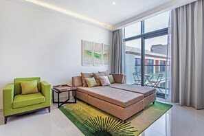 Family Apartment, Non Smoking, City View | Living area | 43-inch LED TV with cable channels - Staycae Celestia (Dubai)