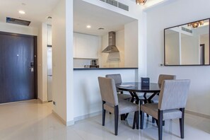 Family Apartment, Non Smoking, City View | Private kitchen | Fridge, cookware/dishes/utensils - Staycae Celestia (Dubai)