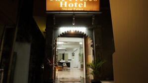 The entrance to The Fresco Hotel with a sign above the door. - Treebo The Fresco Lake Pichola (Udaipur)