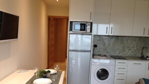 Private kitchen - AQUA II. Apt. 1 Bedroom Terrace Pool View. (Sanxenxo)