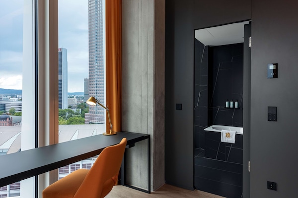 Eco-friendly toiletries, hair dryer, bathrobes, slippers