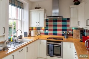 House, Multiple Beds | Private kitchen