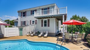 A two-story house with a pool, a balcony, and outdoor furniture. - 3 Mi to Dtwn & Beach! Bristol Home w/ Patio (Bristol)