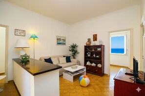 Apartment | Living area | 32-inch flat-screen TV with digital channels, TV