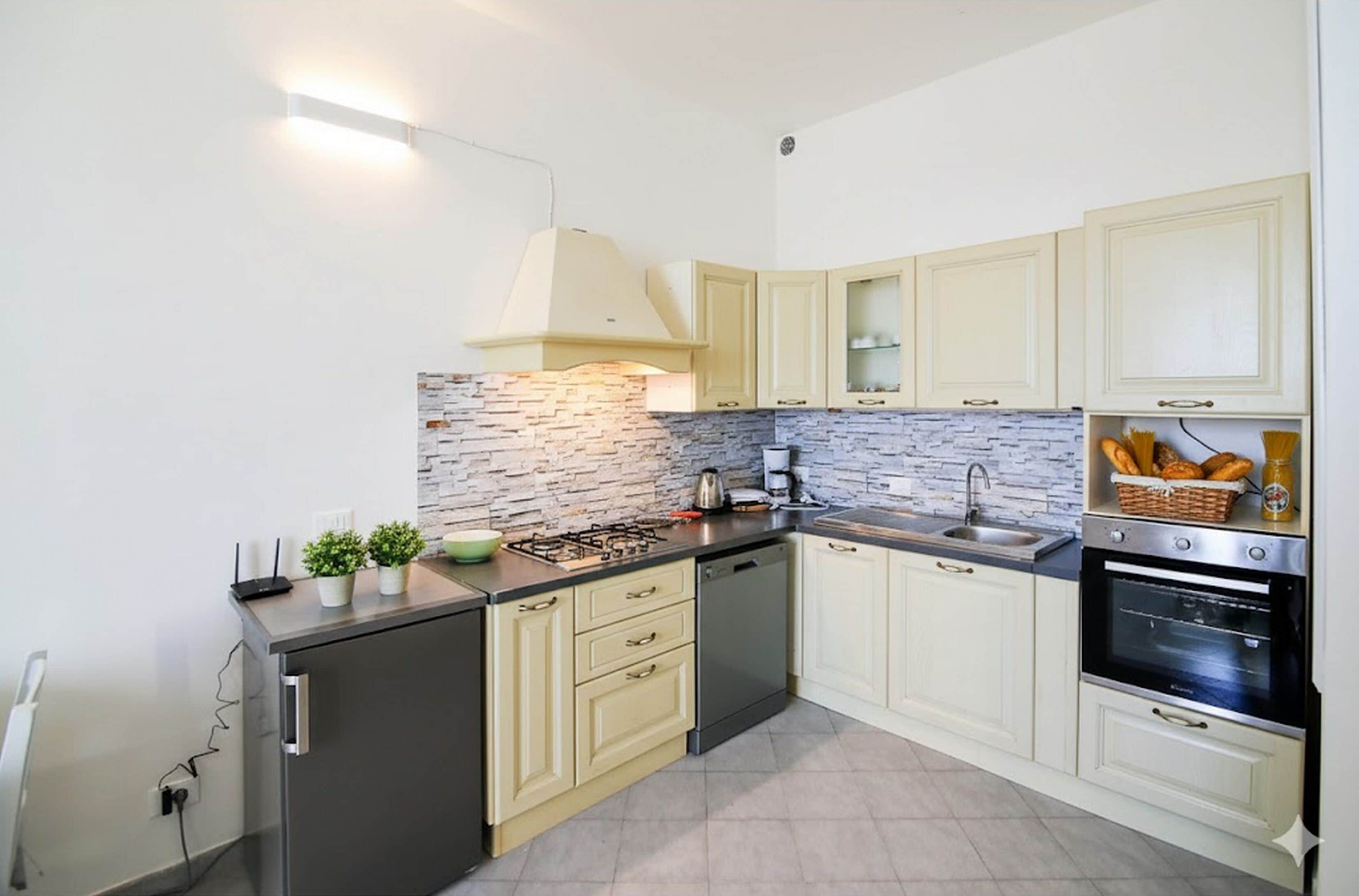 Apartment | Private kitchen | Fridge, oven, stovetop, dishwasher