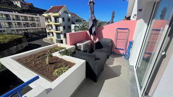 Deluxe Apartment, 1 Queen Bed with Sofa bed, Kitchen, Partial Sea View | Balcony