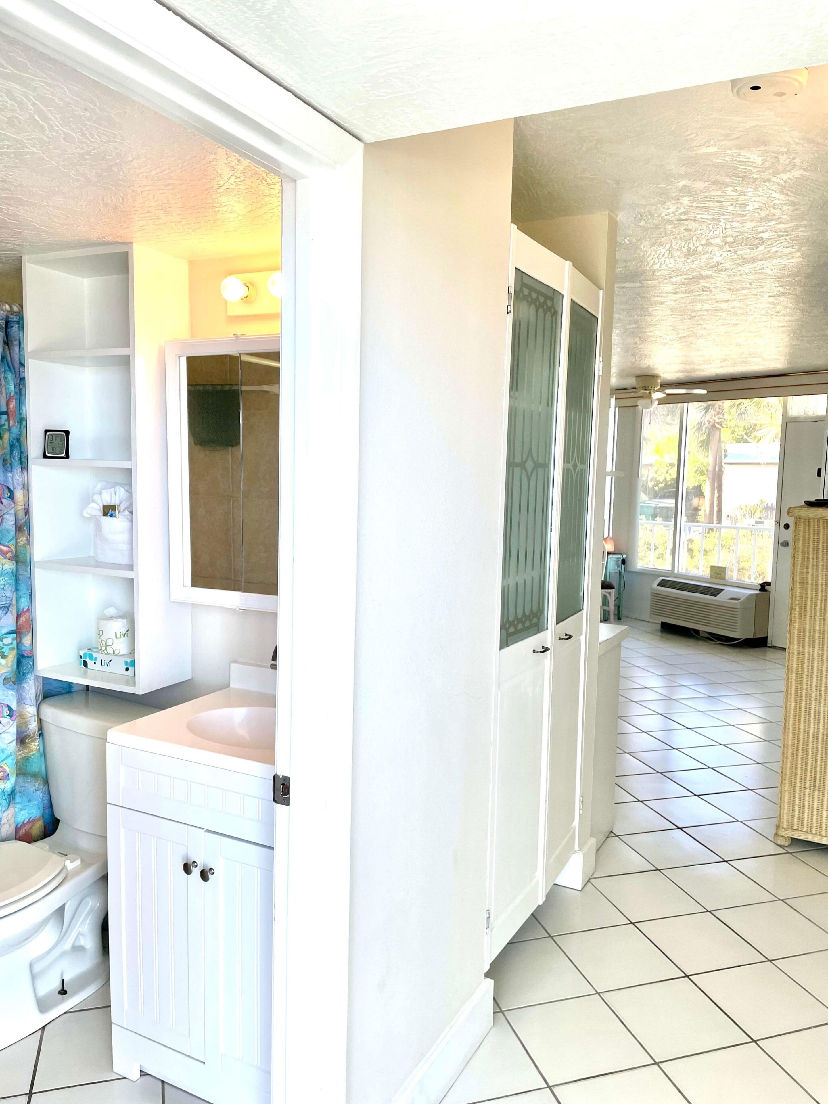 Shower, hair dryer, towels, shampoo