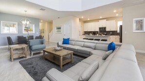 Villa, 5 Bedrooms | Living room - 1569 The Retreat at Champions Gate by Orlando Holiday Rental Homes (Davenport)