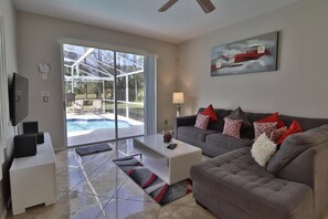 Villa, 5 Bedrooms | Living room - 1640 The Retreat at Champions Gate by Orlando Holiday Rental Homes (Davenport)