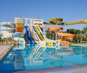 A water park with multiple slides and water features, including a pool. - One Resort Aqua Park & Spa (Monastir)