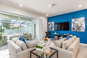 Townhome, 4 Bedrooms | Living room - 9035 The Retreat at Champions Gate by Orlando Holiday Rental Homes (Davenport)