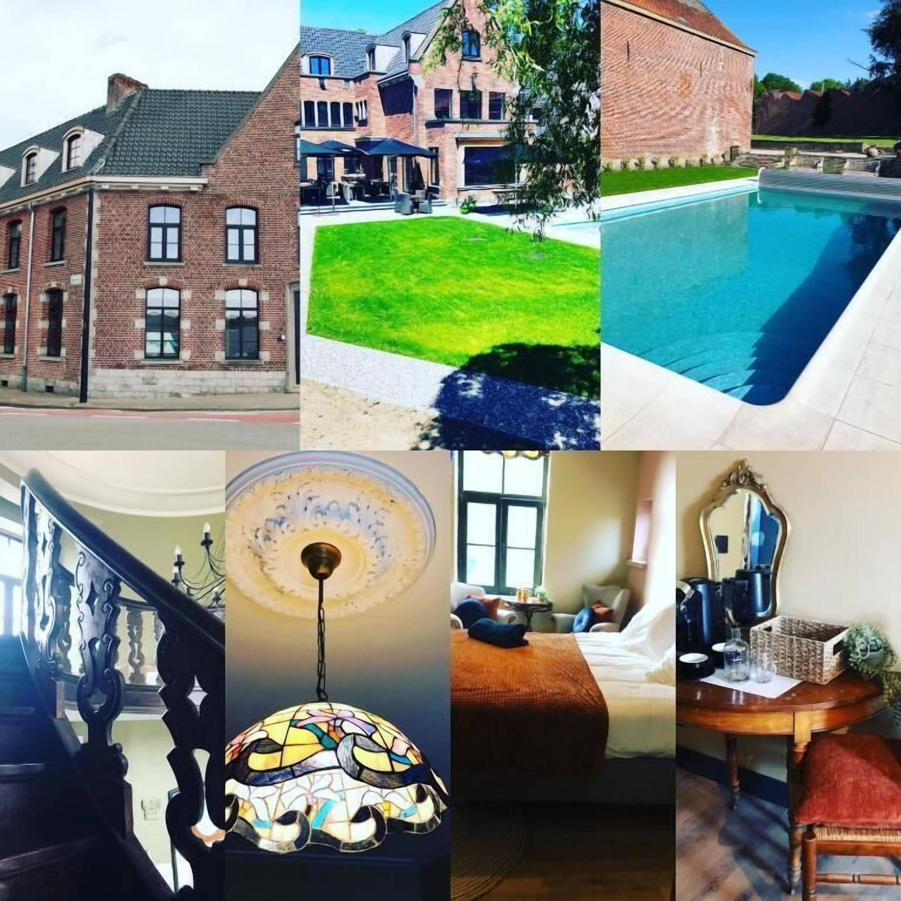 Een bakstenen gebouw met een groot buitenzwembad en een verzorgd gazon.