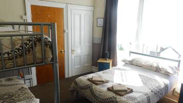 Blackout curtains, iron/ironing board, bed sheets