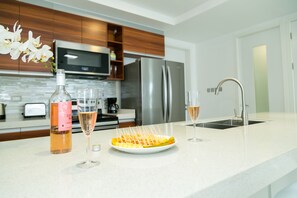 Fridge, microwave, oven, cookware/dishes/utensils
