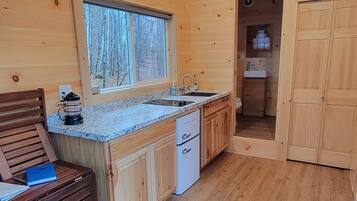 Fridge, stovetop, cookware/dishes/utensils, spices