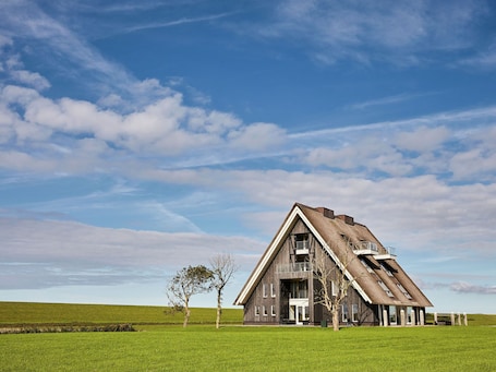 Exterior. Space to Connect: A Coastal Villa
