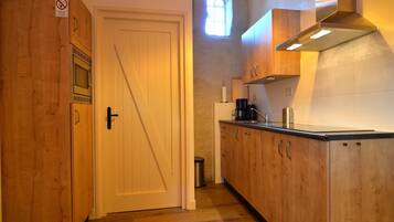 Een koelkast, een magnetron, een vaatwasser