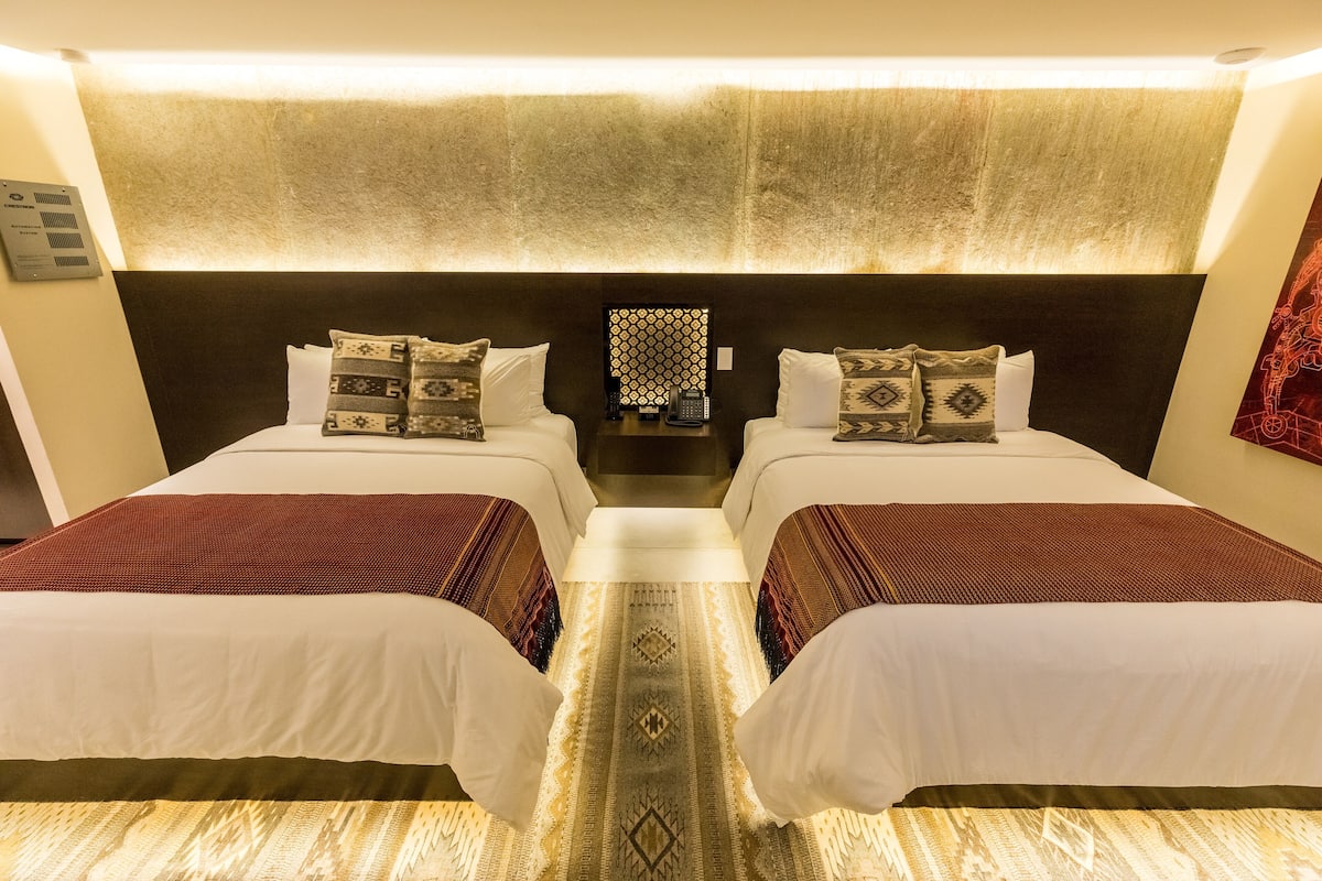 Superior Double Room | Minibar, in-room safe, individually decorated, desk