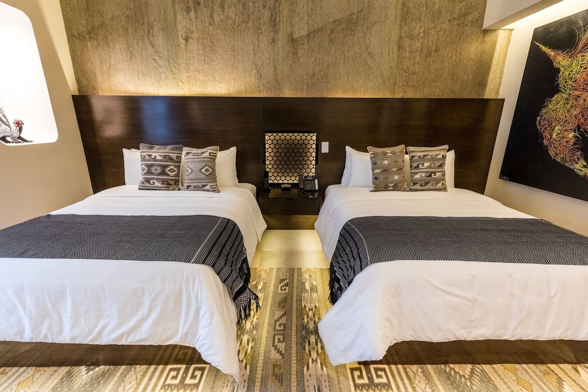 Premier Double Room | Minibar, in-room safe, individually decorated, desk