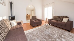 A living room with a sofa set, a coffee table, and a fireplace. - Apartment in Vrsi near the Sea (Vrsi-Mulo)