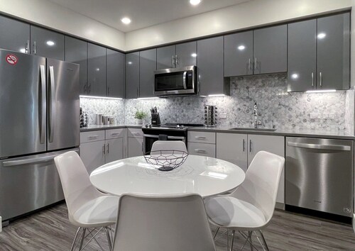 Pets Stay Free • Private Terrace • Elevator • King Beds • In-Unit W/D