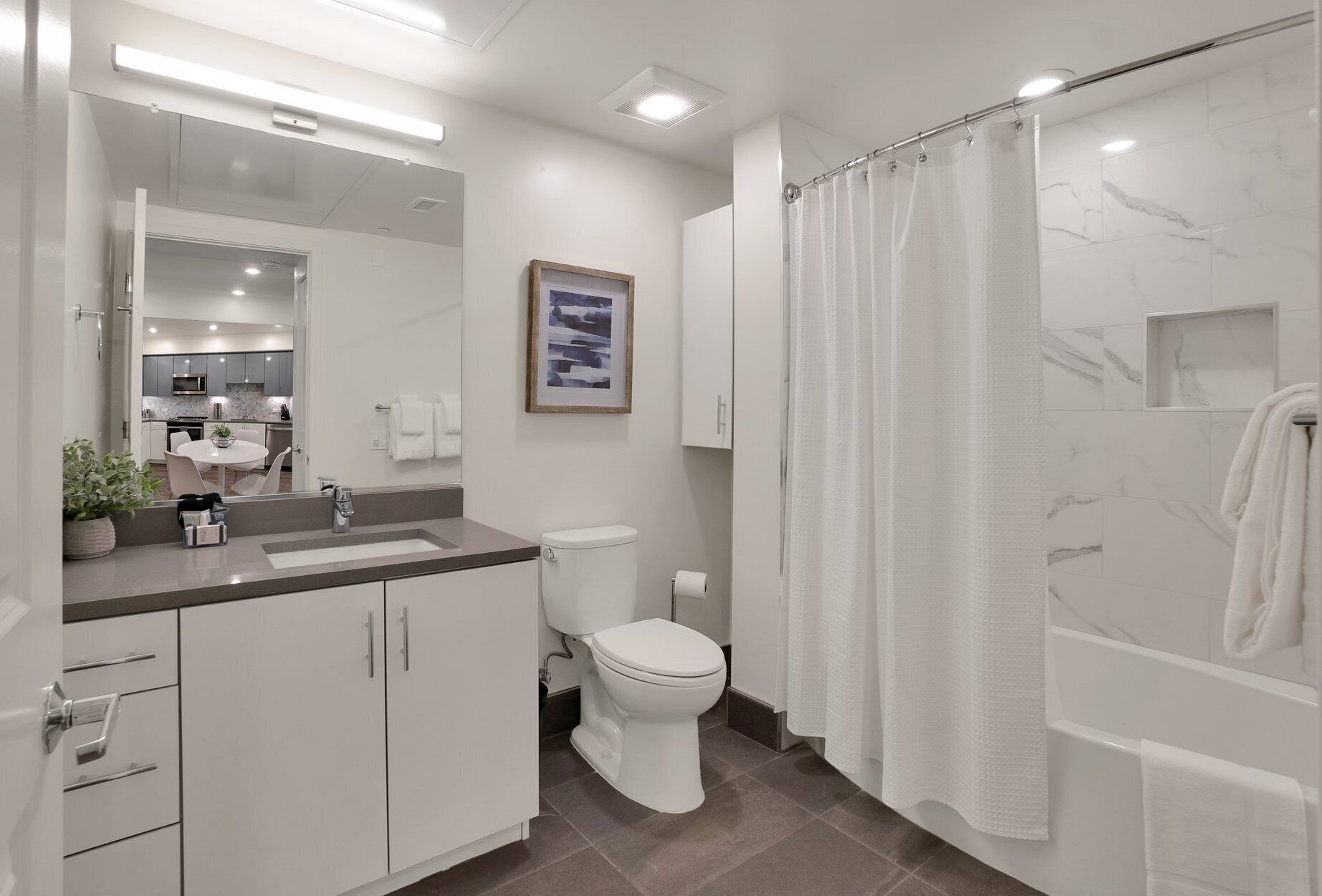 Combined shower/bathtub, hair dryer, towels, soap