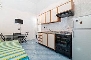 Fridge, oven, stovetop, dining tables