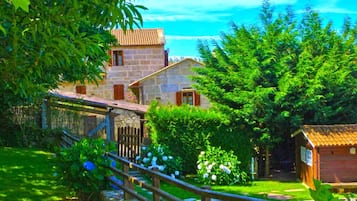 Escape to a serene retreat surrounded by lush greenery and a tranquil pool.